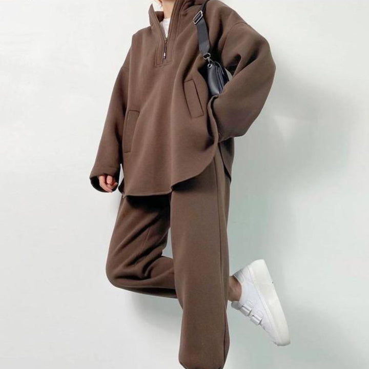Kvinnelig oversized fleece treningsdrakt med høy krage og glidelås Skjora
