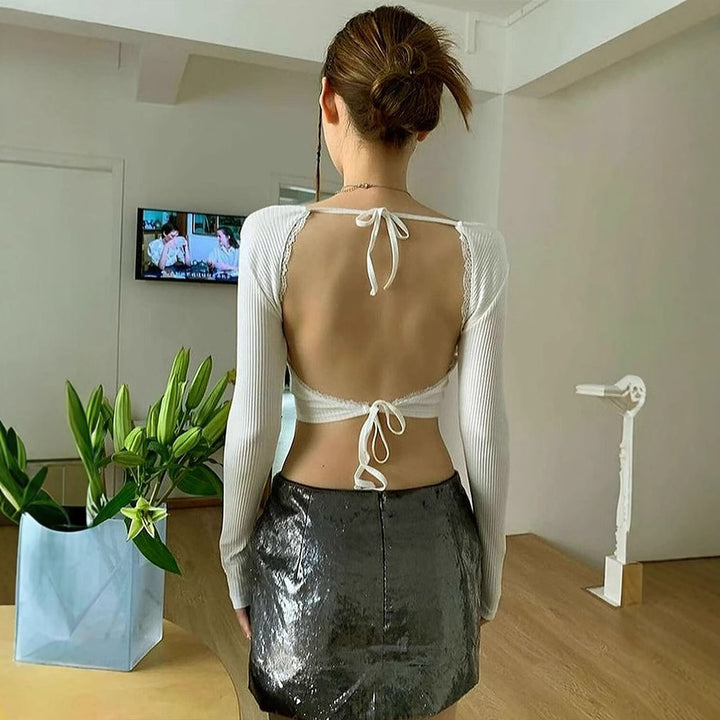 Dame Crop-Top med volangdetaljer og ryggbinding Skjora