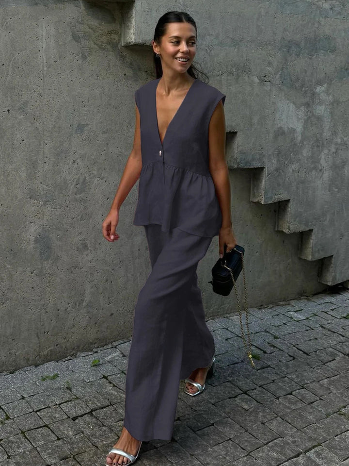 Dame luftig Jumpsuit med V-hals og flytende snitt Skjora