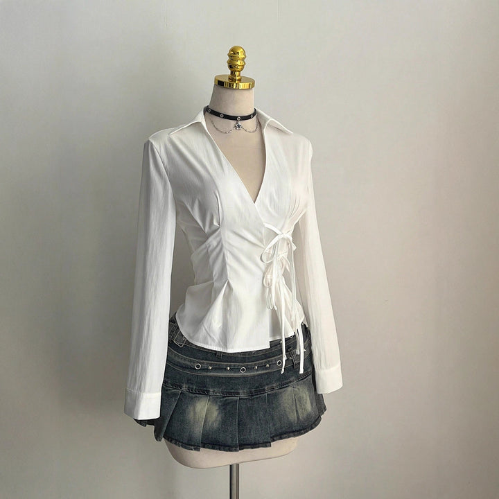 Damer Elegant omslagsbluse med fine volangdetaljer Skjora