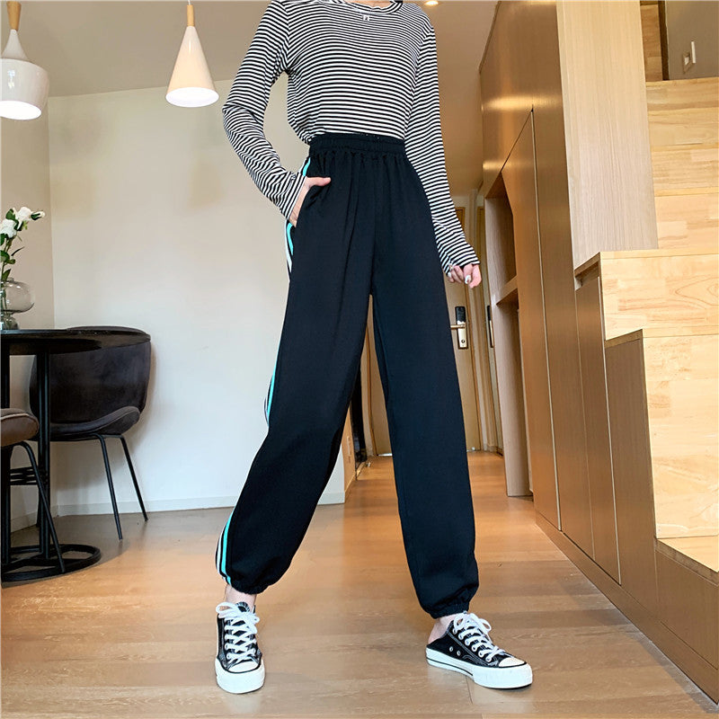 Dame sporty joggebukser med stilige sideninsert Skjora