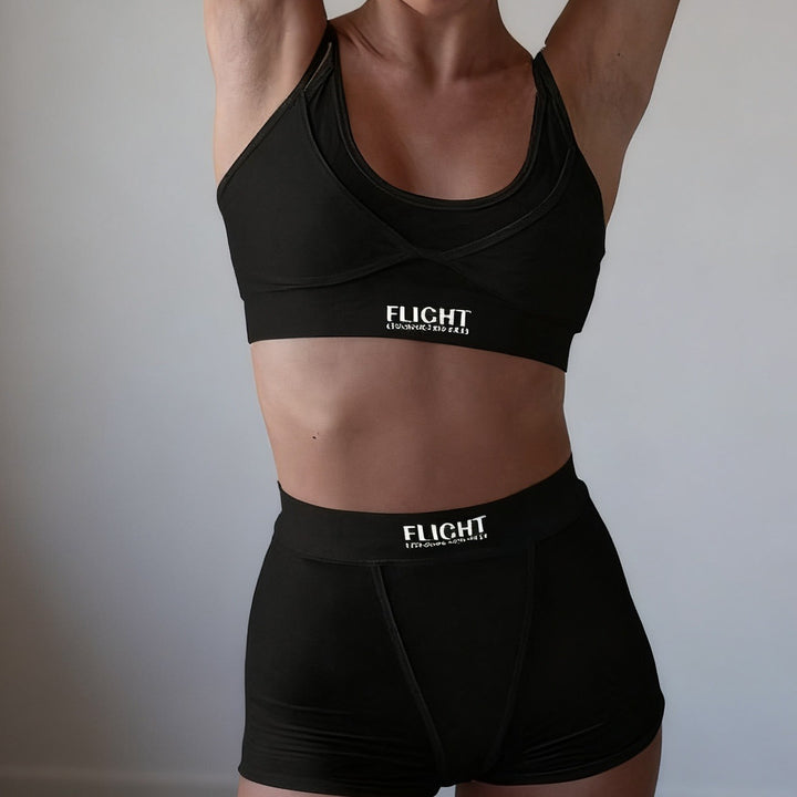 Damer sporty undertøysett med moteriktig crop-top og behagelige shorts Skjora