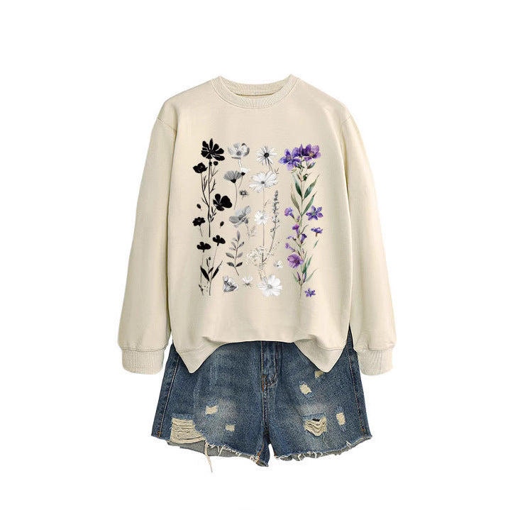 Dame sweatshirt med blomster grafisk design og myk innvendig fôr Skjora