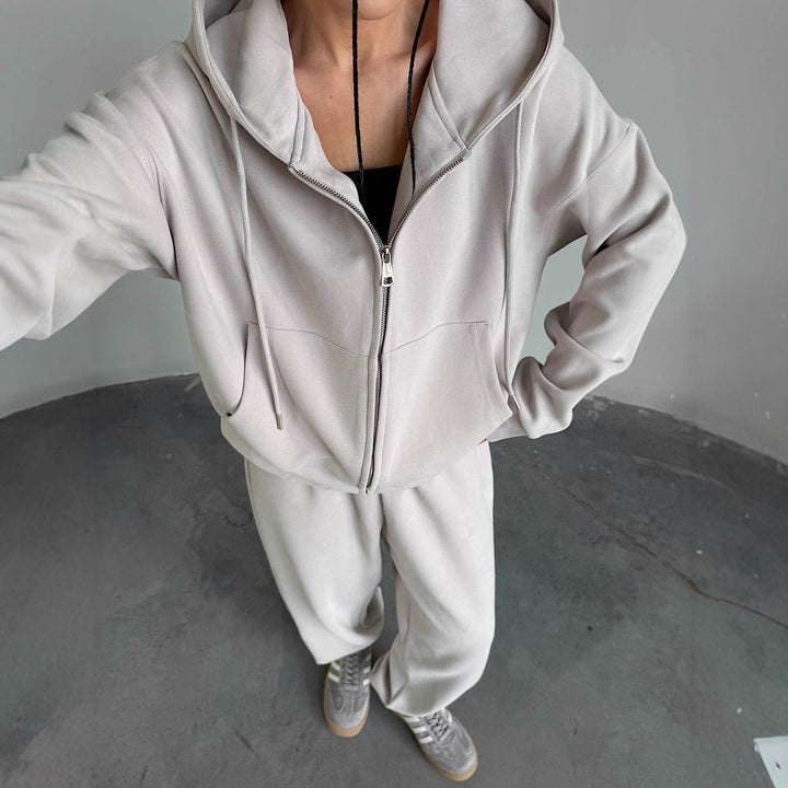 Kvinnekoselig hettegenser jumpsuit med høy kvalitets glidelås og avslappet passform