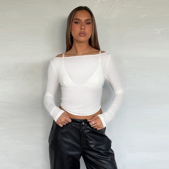 Dames langermet topp med transparent mesh-design og off-shoulder utseende