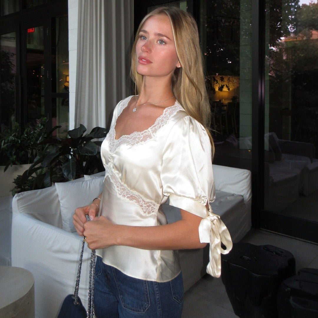 Ladies' satin blouse with pointed details Skjora