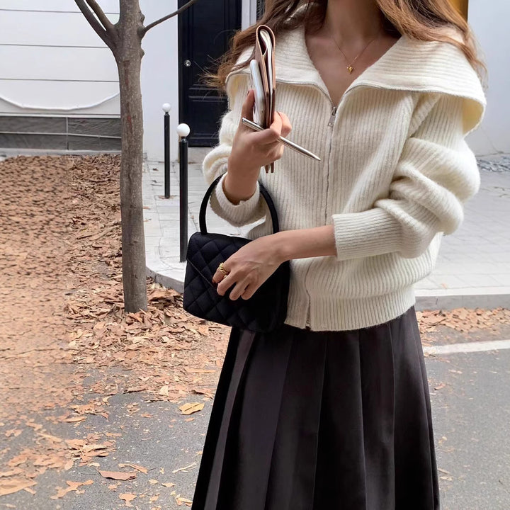 Kvinne cardigan med bred krage og teksturert design Skjora