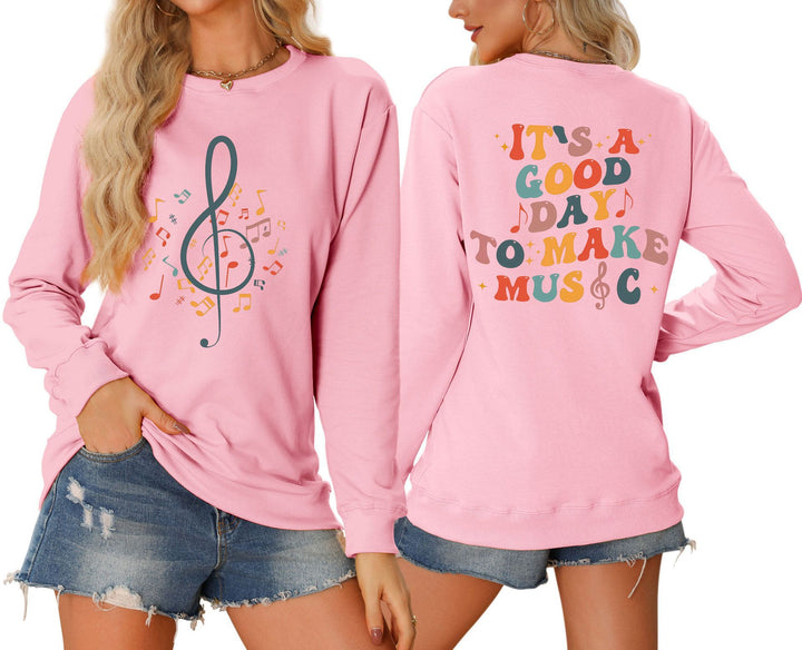 Dame sweatshirt med musikalsk motiv og kreativ skrift Skjora