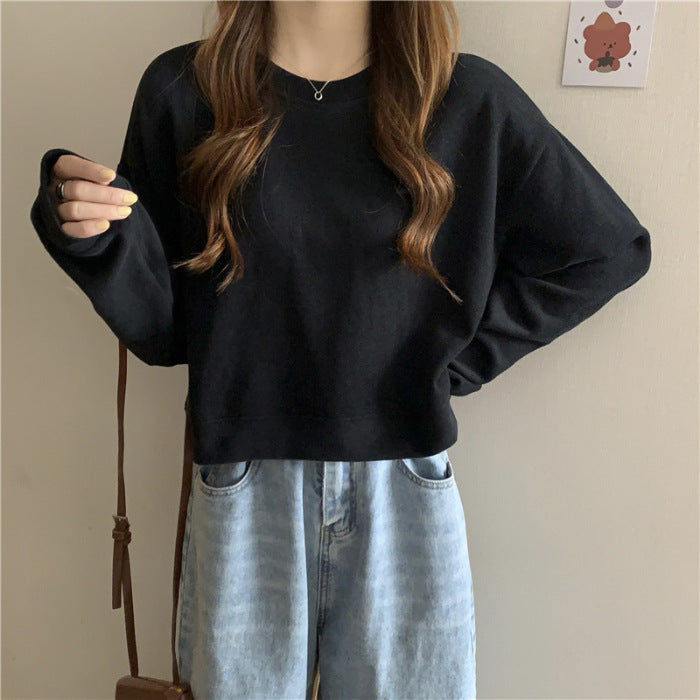 Kvinne casual cropped genser laget av myk bomullsblanding med stilren rund hals Skjora