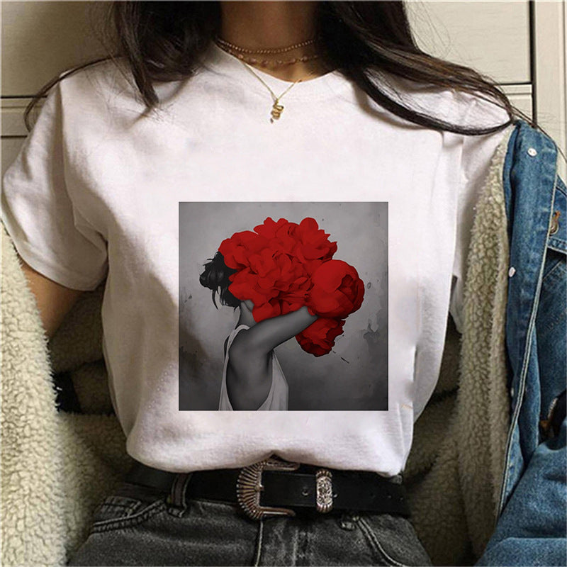 Dame T-skjorte med blomstertrykk og kreativt kunstmotiv Skjora