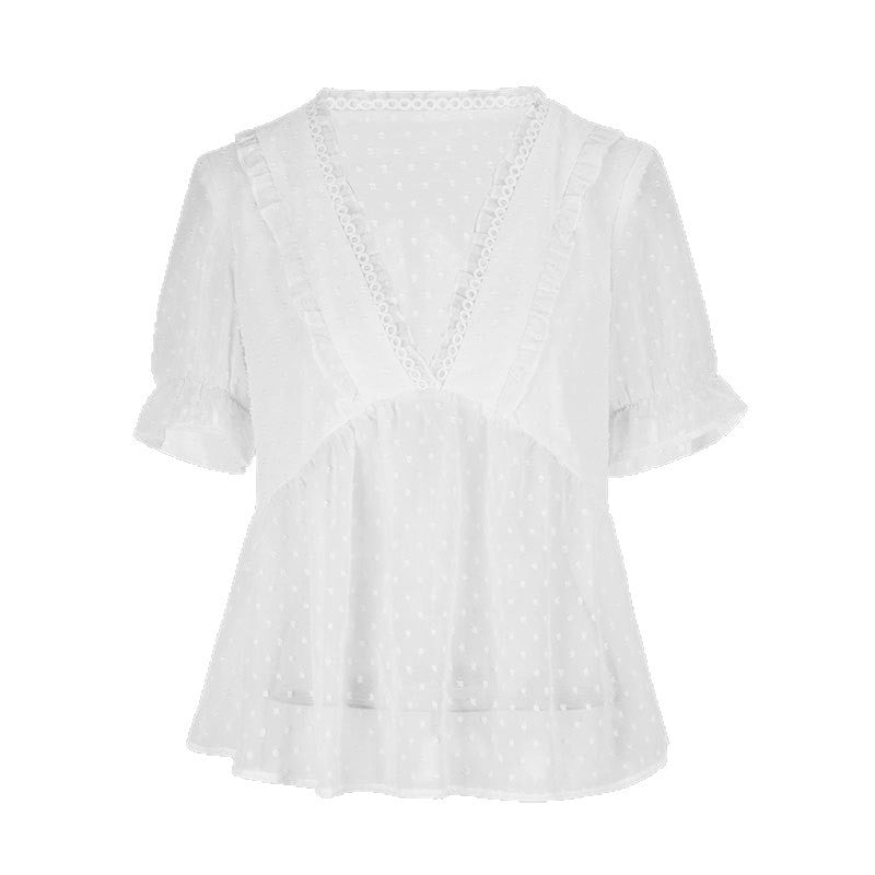 Dame bluse med volangdetaljer og prikkedesign Skjora