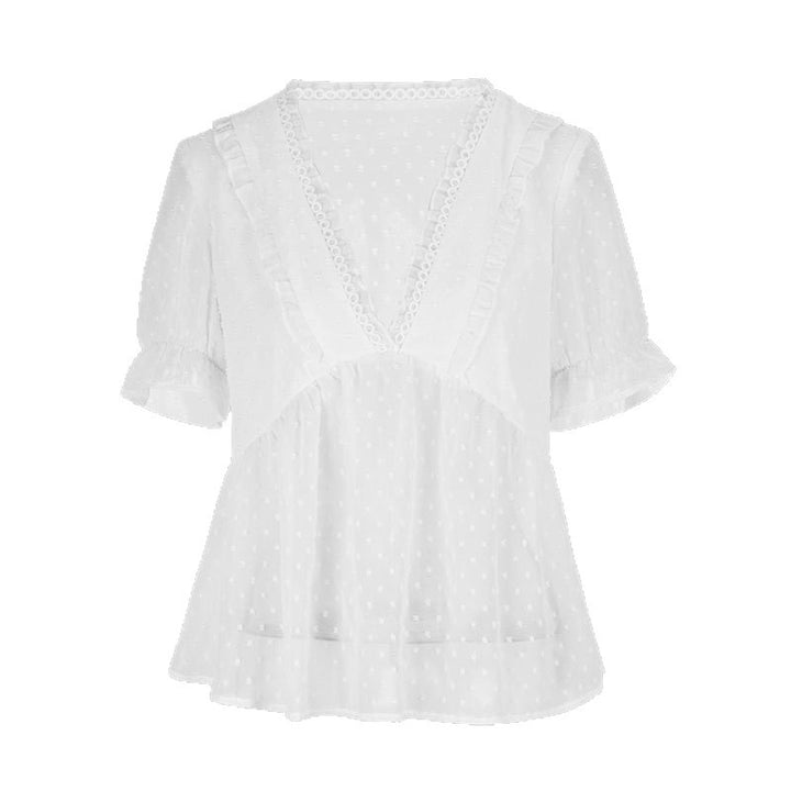 Dame bluse med volangdetaljer og prikkedesign Skjora