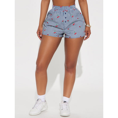 Dame Shorts med livlig rutemønster og lekete fruktprint Skjora