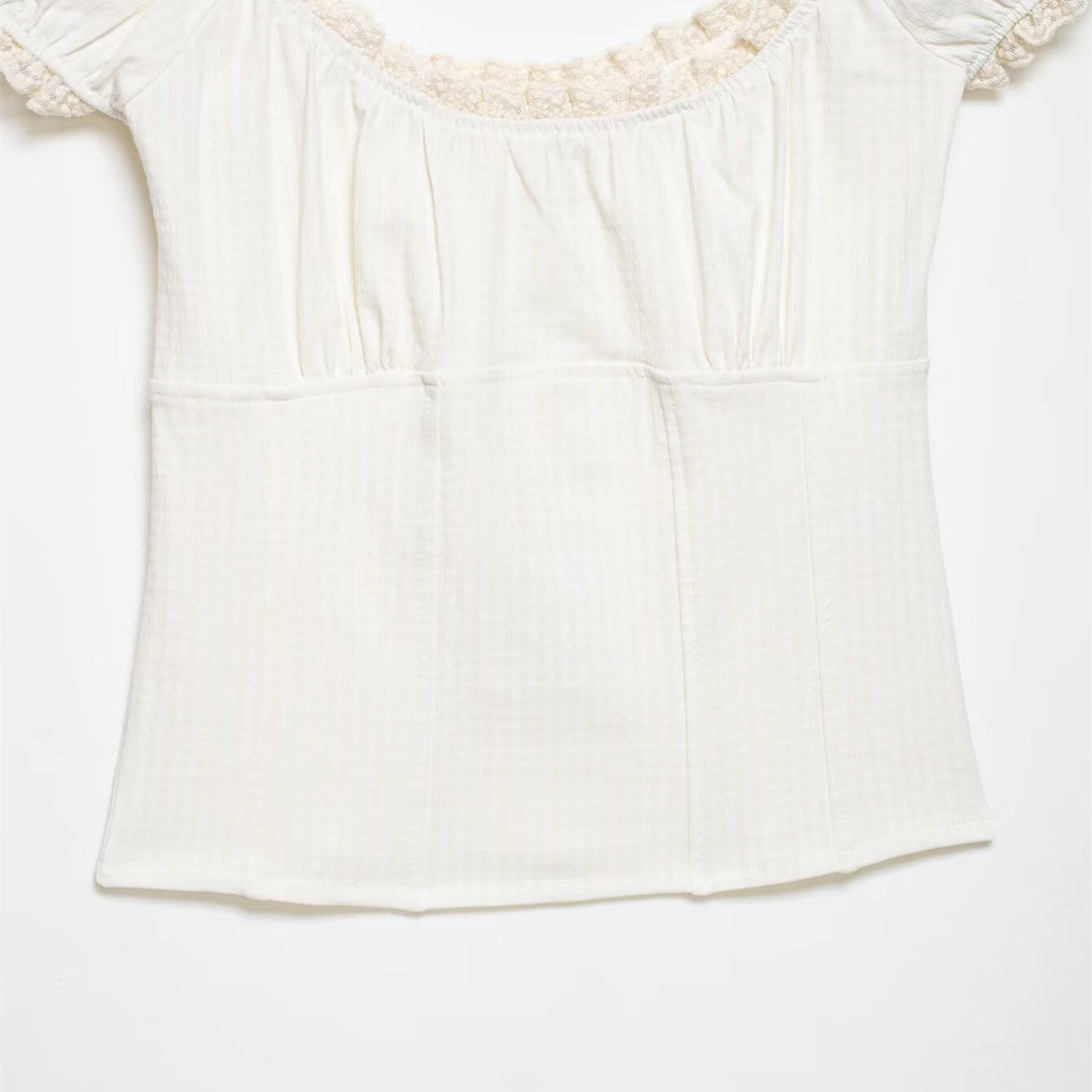 Ladies' top with elegant ruffle edge Skjora