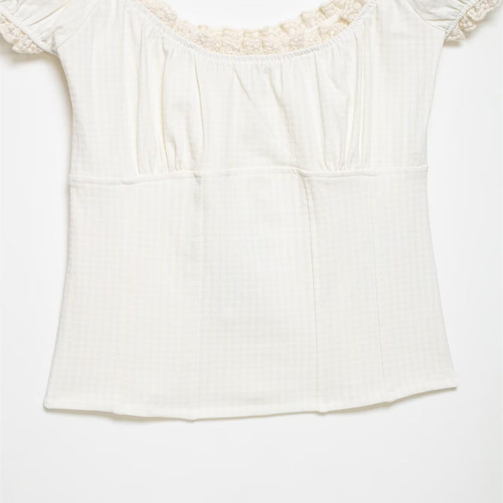 Ladies' top with elegant ruffle edge Skjora