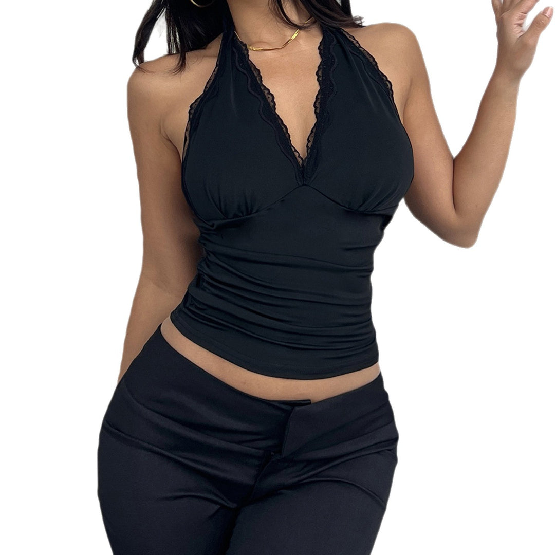 Dame Elegant halterneck-top med spennende V-u-cut og fashionable spisser accentuerer Skjora