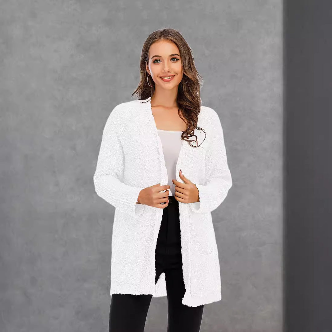 Kvinnekomfortabel cardigan med åpen skjæring og store lommer Skjora