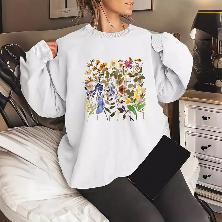 Dame sweatshirt med blomsterdesign og komfortabel passform Skjora