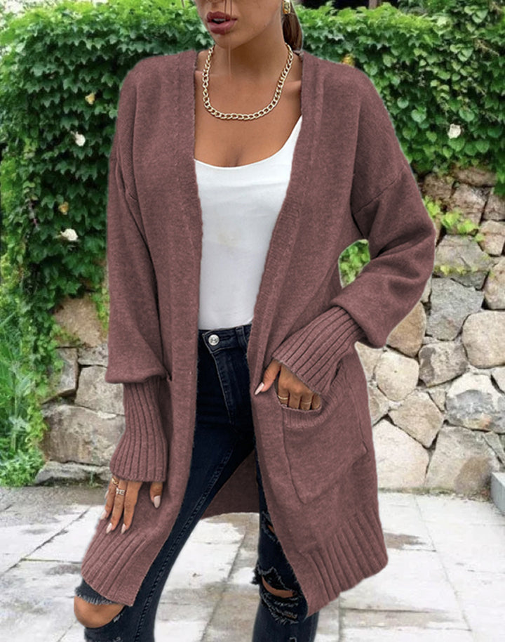 Kvinnens chunky strikk cardigan med dype lommer og avslappet design Skjora