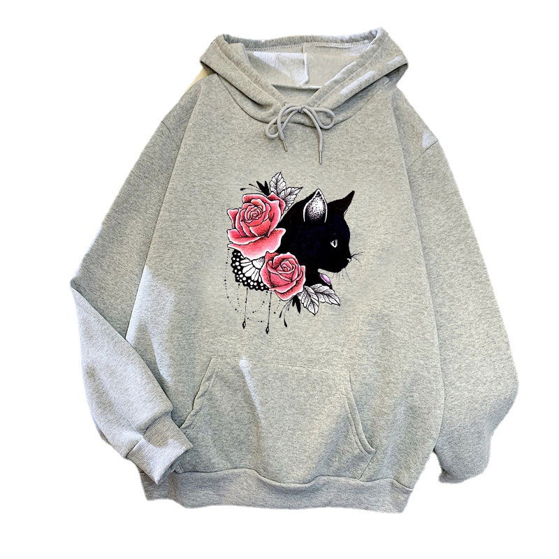 Dame hettegenser med blomstermotiv av katt Skjora
