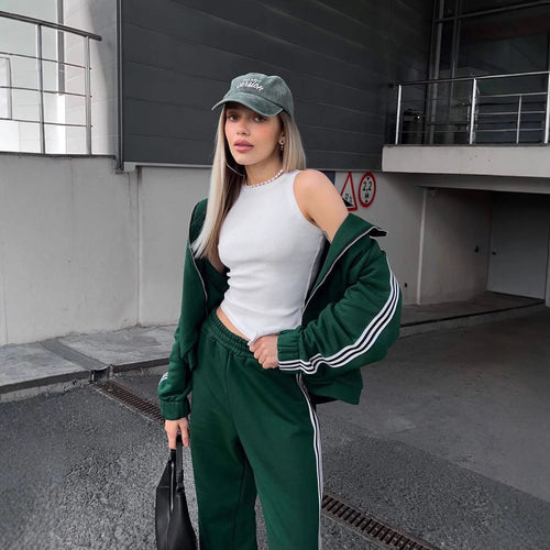 Dame sporty velour joggedress med sidestriper Skjora