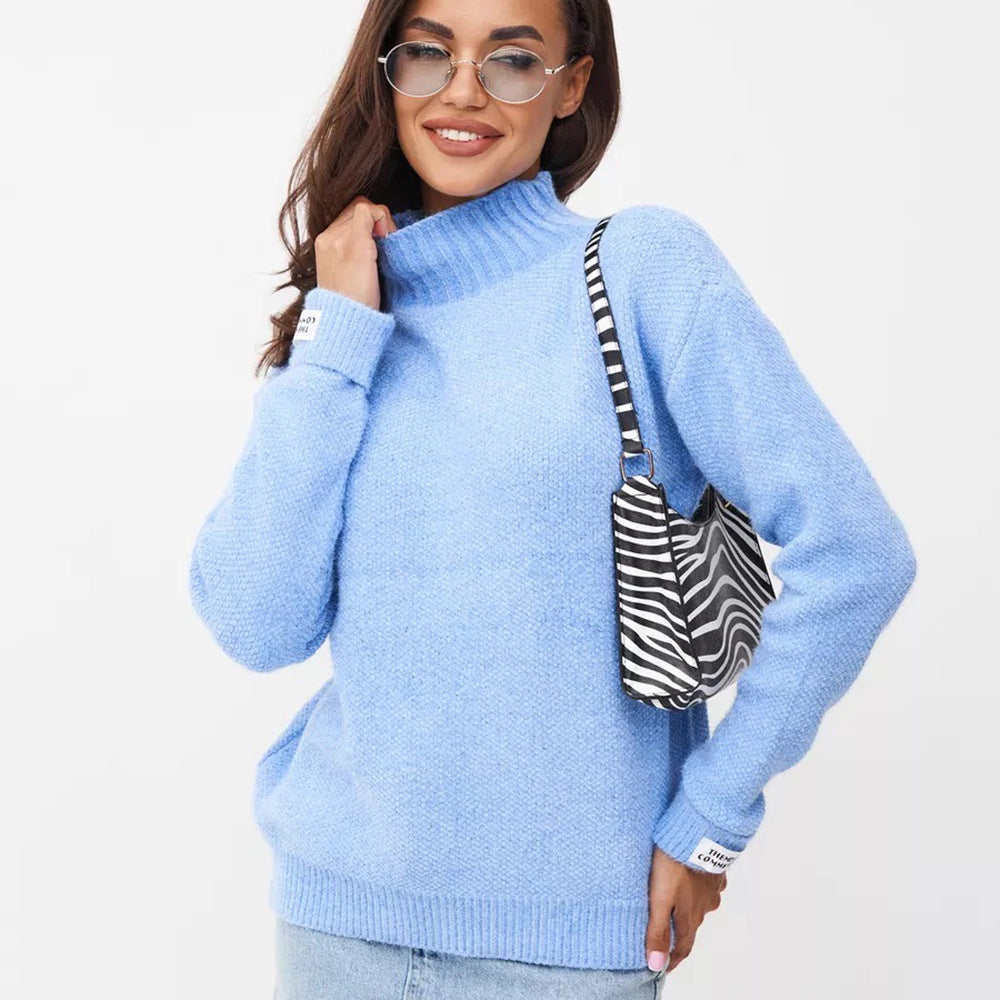 Kvinnenes Høyhalsgenser laget av myk strikk Skjora