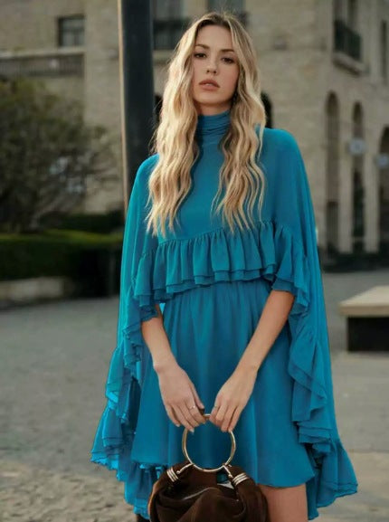 Dame Elegant rynkedress med høy hals og flytende snitt Skjora