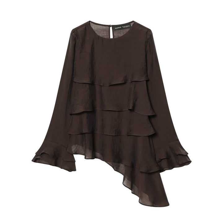 Dame asymmetrisk bluse med volangdetaljer og elegant fall Skjora