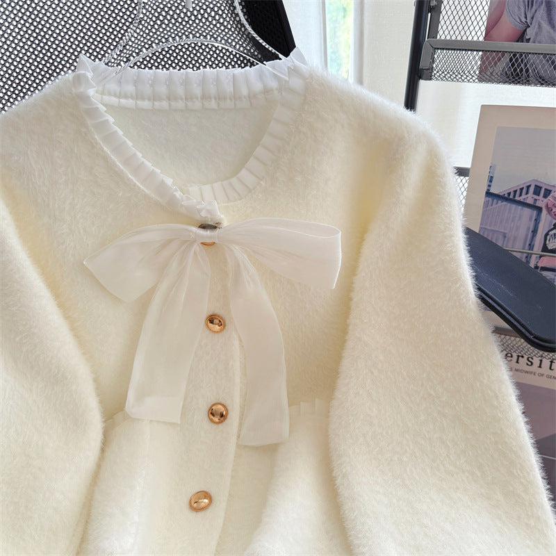 Dame Fluffy Cardigan med Elegant Sløyfe Krage og Dekorative Knapper Skjora