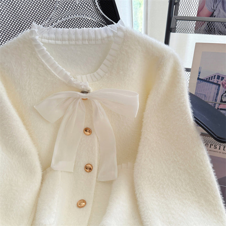 Dame Fluffy Cardigan med Elegant Sløyfe Krage og Dekorative Knapper Skjora