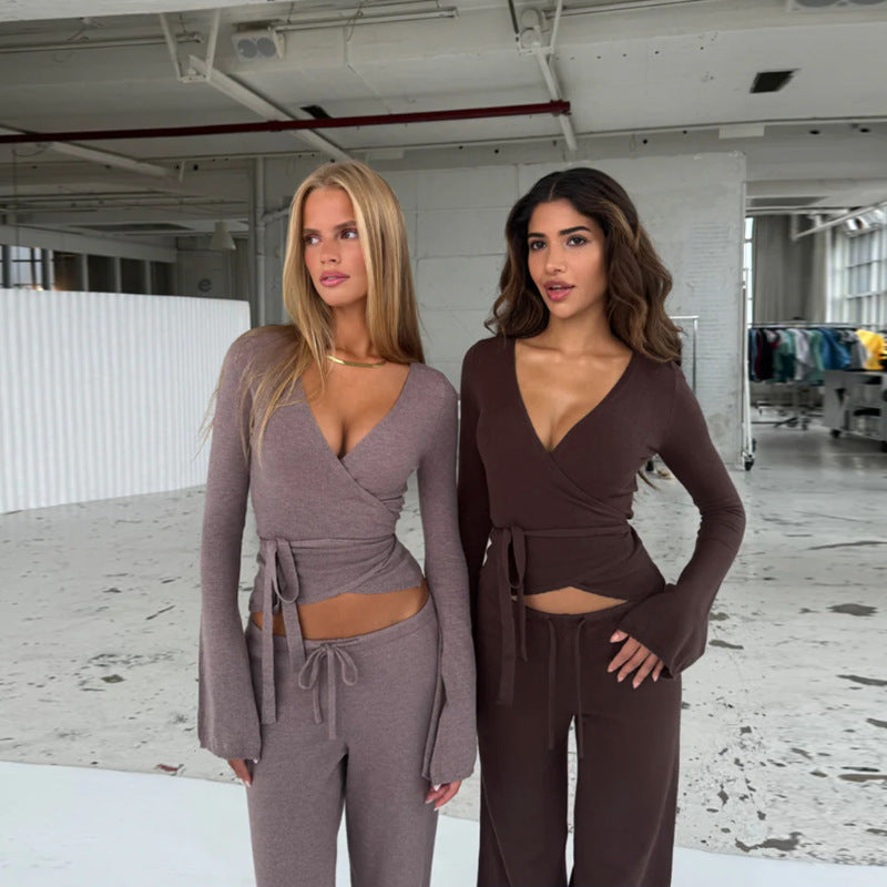 Dame løs jumpsuit med omslagdesign og lange ermer Skjora