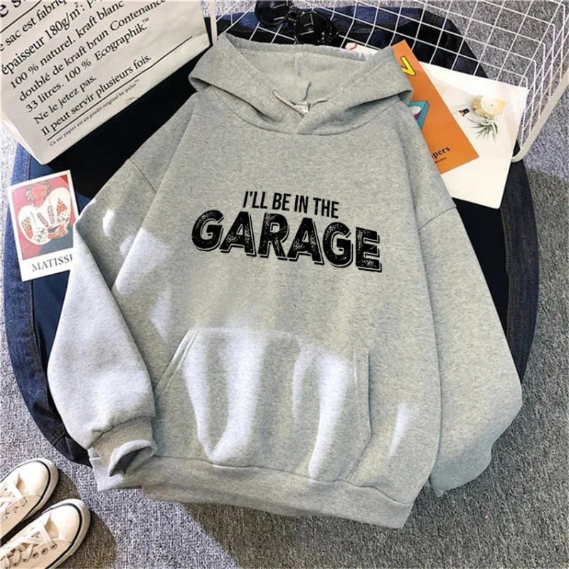 Damegenser med kreativ garage-motiv Skjora