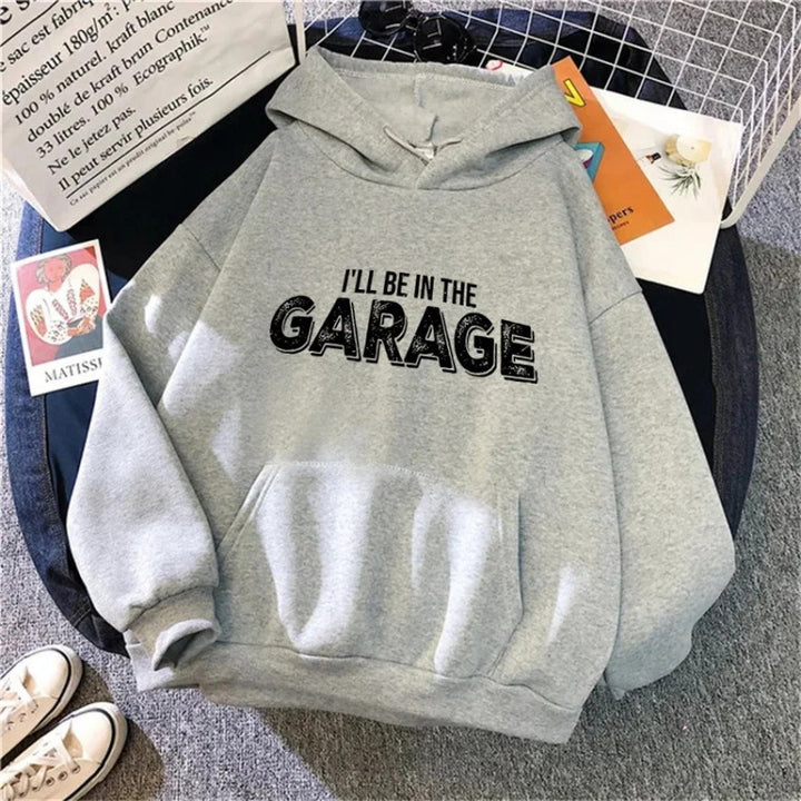Damegenser med kreativ garage-motiv Skjora