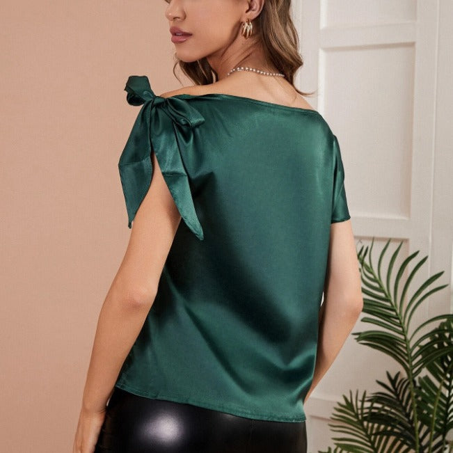 Dame Elegant formet topp med off-the-shoulder design og dekorative knuter Skjora