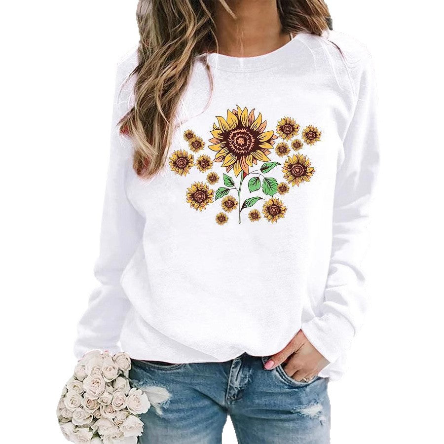 Kvinne genser med blomster solsikke motiv og behagelig passform Skjora