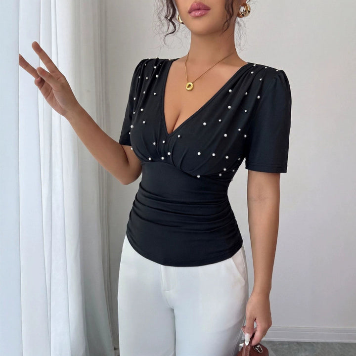 Dame elegant bluse med perle-detalj Skjora