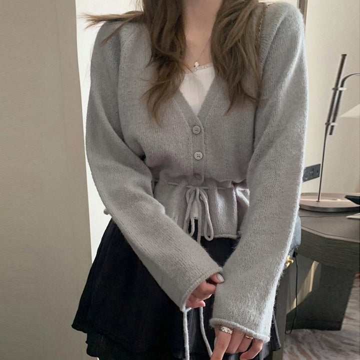 Kvinne cardigan med tilpasset design og knytbar belte Skjora