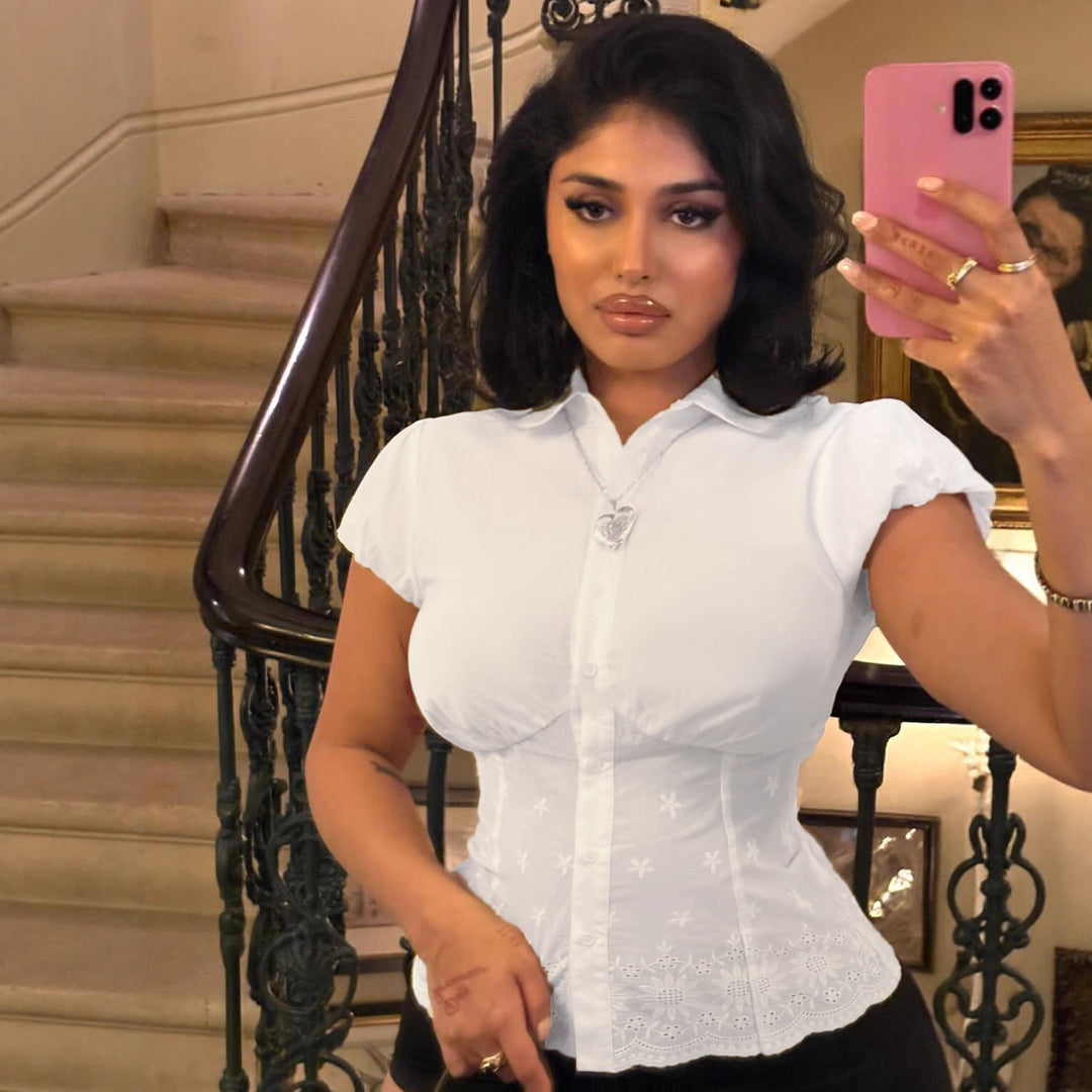 Damebluse med elegant spissen dekorasjon og pufferm  Skjora