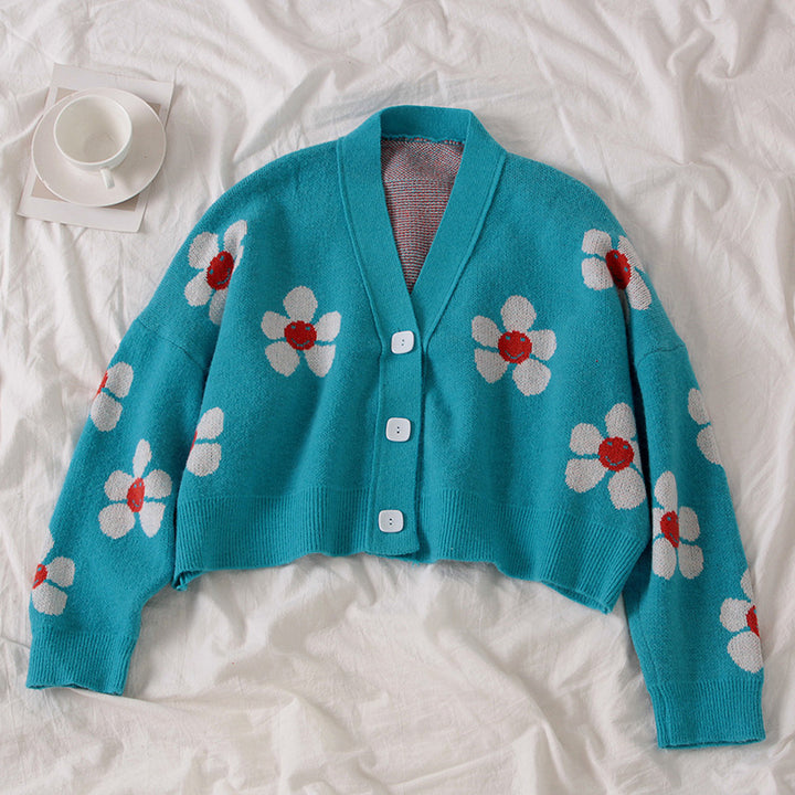 Kvinnes chunky strikk cardigan med blomstermønster og knappedetaljer Skjora