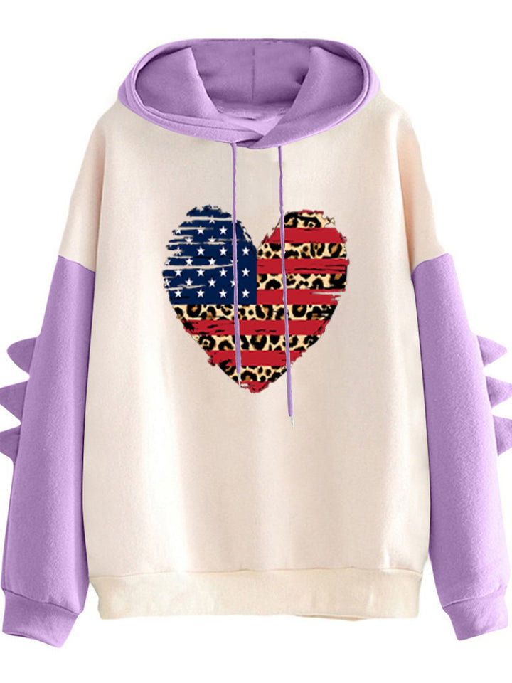 Kvinnes hoodie med unikt hjerte design og trendy detaljer Skjora