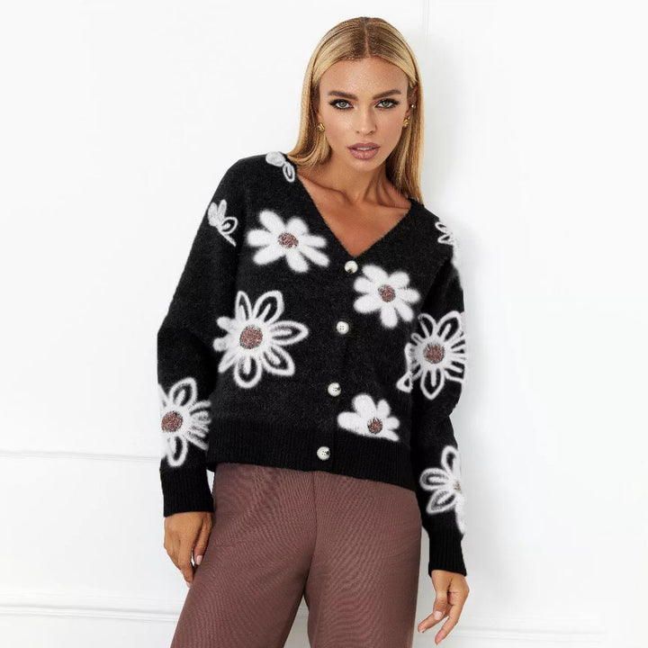 Kvinnens Koselige Cardigan med Blomster Mønster og Knappe Detaljer Skjora