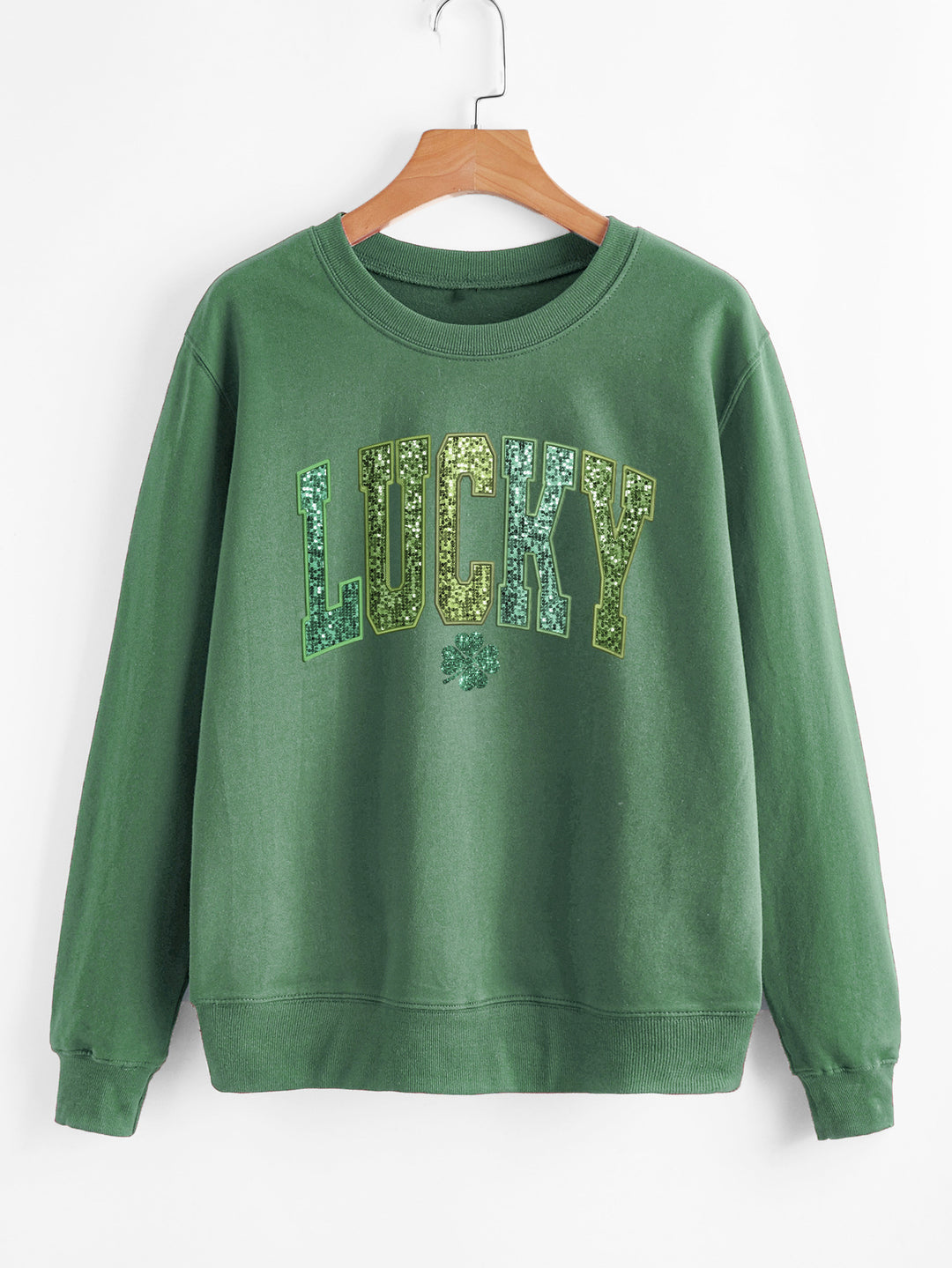 Dame uformell sweatshirt med glitrende skrift og firkløvermotiv Skjora