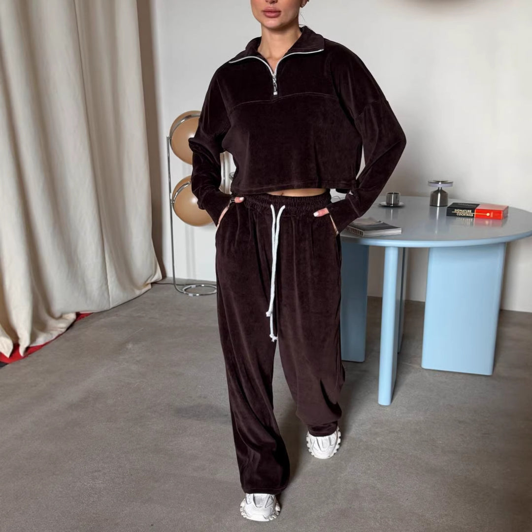 Kvinne kort sweatshirt med halv glidelås og brede bukser Skjora