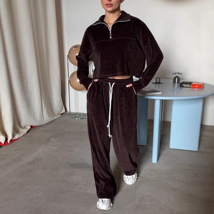 Kvinne kort sweatshirt med halv glidelås og brede bukser Skjora