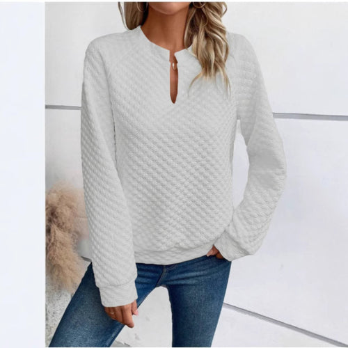 Damegenser med teksturert quiltet design og fashionable halslinning Skjora