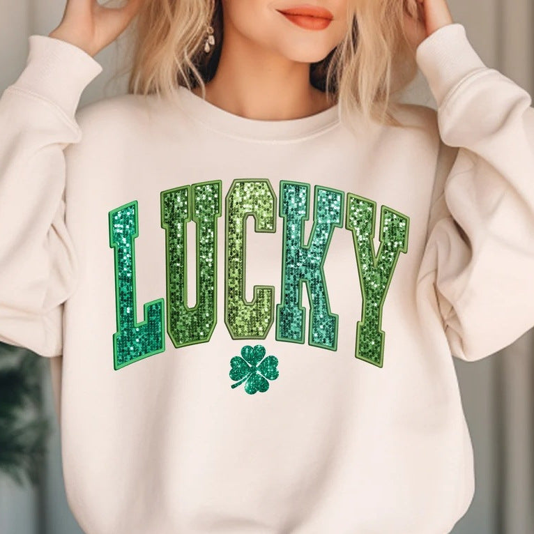 Dame uformell sweatshirt med glitrende skrift og firkløvermotiv Skjora