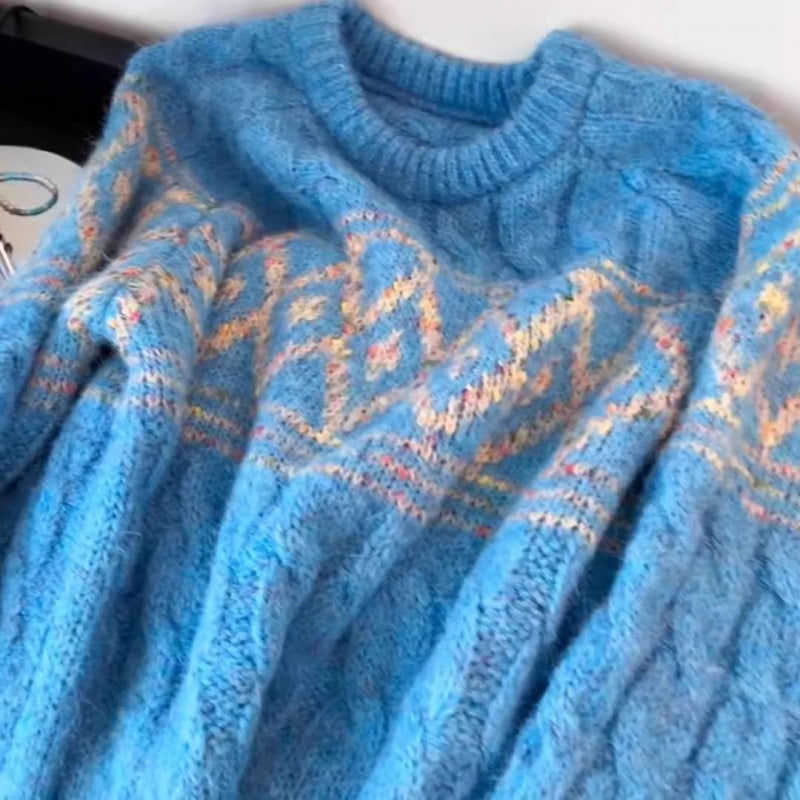 Kvinnens chunky strikkegenser med nordisk mønster og mykt materiale Skjora
