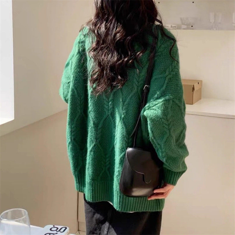 Women's knitted sweater with cable design and casual fit Skjora