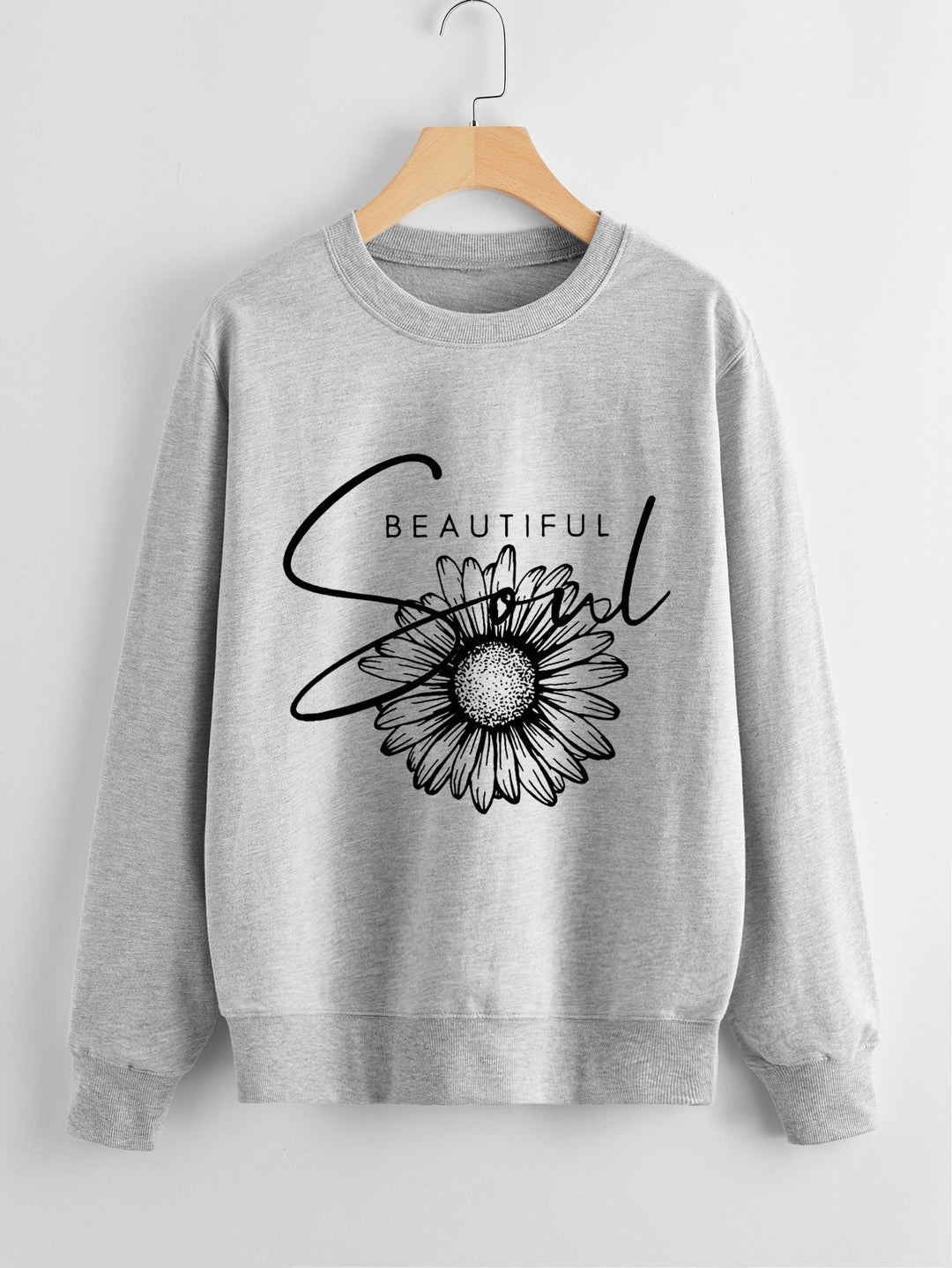 Dame genser med blomstermotiv og inspirerende tekst Skjora