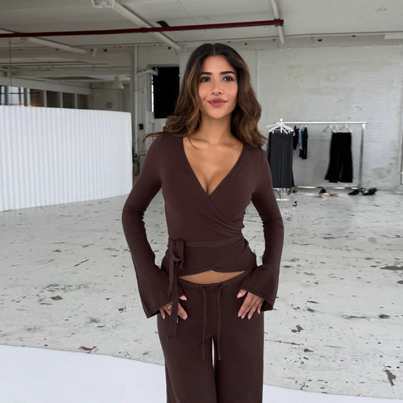 Dame løs jumpsuit med omslagdesign og lange ermer Skjora